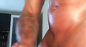 Black Hunk Jerks Off to Porn and Cums Hard