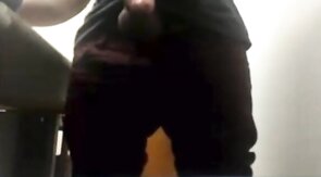 Brazilian Daddy Strokes His Big Uncut Cock at Work