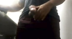 Brazilian Daddy Strokes His Big Uncut Cock at Work