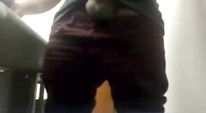 Brazilian Daddy Strokes His Big Uncut Cock at Work