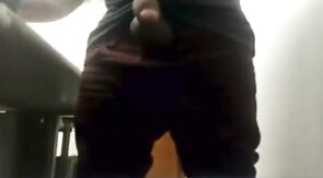 Brazilian Daddy Strokes His Big Uncut Cock at Work