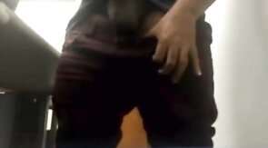 Brazilian Daddy Strokes His Big Uncut Cock at Work