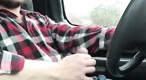 Stroking my big cock while driving