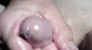 Twink's Webcam Handjob: Small Cock, Big Condom Fun