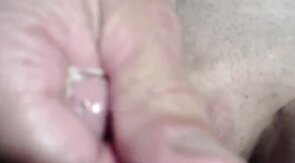 Twink's Webcam Handjob: Small Cock, Big Condom Fun