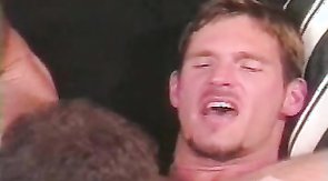 Muscled man is giving his boyfriend a gorgeous blowjob