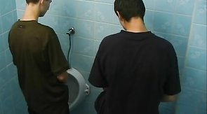 Young mate is sucking his boyfriend's dick in the toilet