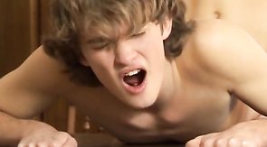 Long-haired young mate is being fucked from behind