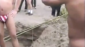 Muscled Asian Stud Bares Almost All at the Beach