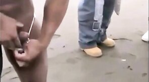 Muscled Asian Stud Bares Almost All at the Beach