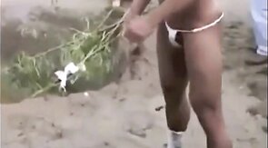 Muscled Asian Stud Bares Almost All at the Beach