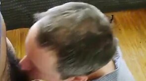 Amateur Takes On Two in a Group Blowjob