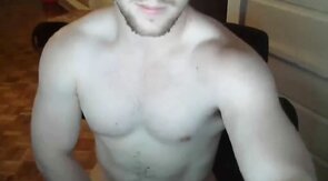 Muscled Hunk Strokes and Shoots a Load on Cam