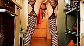 crossdresser with red wig and black laces
