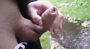 Pissing Outdoors with a Big Cock Twink