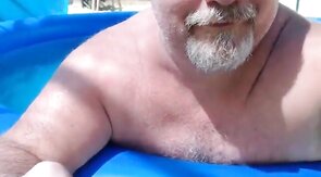 Bearded Daddy Plays Naked by the Pool