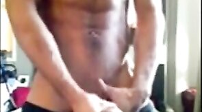 Muscular amateur strokes his big cock and explodes!