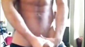 Muscular amateur strokes his big cock and explodes!