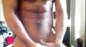 Muscular amateur strokes his big cock and explodes!