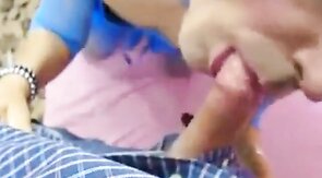 Crossdresser Deepthroats a Big Cock