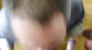 Amateur Takes On Two in a Group Blowjob