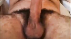 HAIRY LATINO DADDY BEAR STROKES HIS FAT COCK