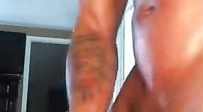 Black Hunk Jerks Off to Porn and Cums Hard