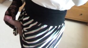 Big-cock crossdresser cums on leg in pantyhose solo video