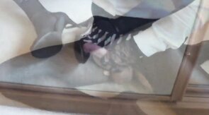 Big-cock crossdresser cums on leg in pantyhose solo video