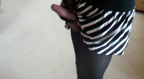 Big-cock crossdresser cums on leg in pantyhose solo video