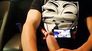 Big-Cocked Man Strokes in Car While Watching Porn