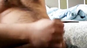 Fat Bear Jacks Off During a Massage