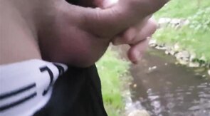 Pissing Outdoors with a Big Cock Twink