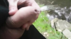 Pissing Outdoors with a Big Cock Twink