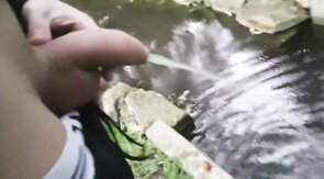Pissing Outdoors with a Big Cock Twink