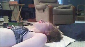 Sissy cums on self while dressed up