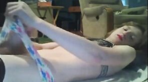 Sissy cums on self while dressed up