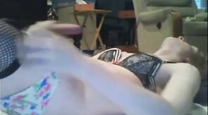 Sissy cums on self while dressed up