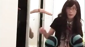 Asian Crossdresser Plays with Sex Toy