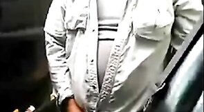 Bearded daddy strokes his cock by his truck outdoors.