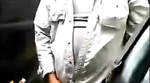 Bearded daddy strokes his cock by his truck outdoors.