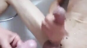 Pissing and cumming on my big-dicked buddy made him explode