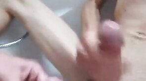 Pissing and cumming on my big-dicked buddy made him explode