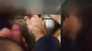Sucking a Stranger's Cock Under the Stall