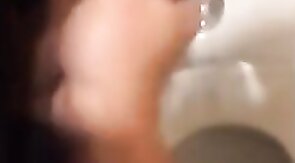 Hardcore Action in the Bathroom with Gaping and Handjobs