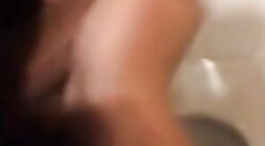 Hardcore Action in the Bathroom with Gaping and Handjobs