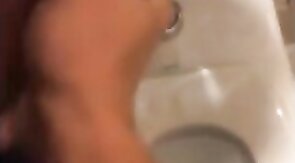 Hardcore Action in the Bathroom with Gaping and Handjobs