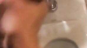 Hardcore Action in the Bathroom with Gaping and Handjobs