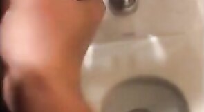 Hardcore Action in the Bathroom with Gaping and Handjobs