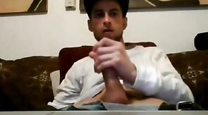 Ripped Stud Strokes His Big Cock to a Webcam Orgasm